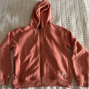 Woman’s north face pink zip up size medium